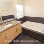 Cougar Ridge West Calgary Rental | Flexible 4 Bed + Bonus Space (RP024)